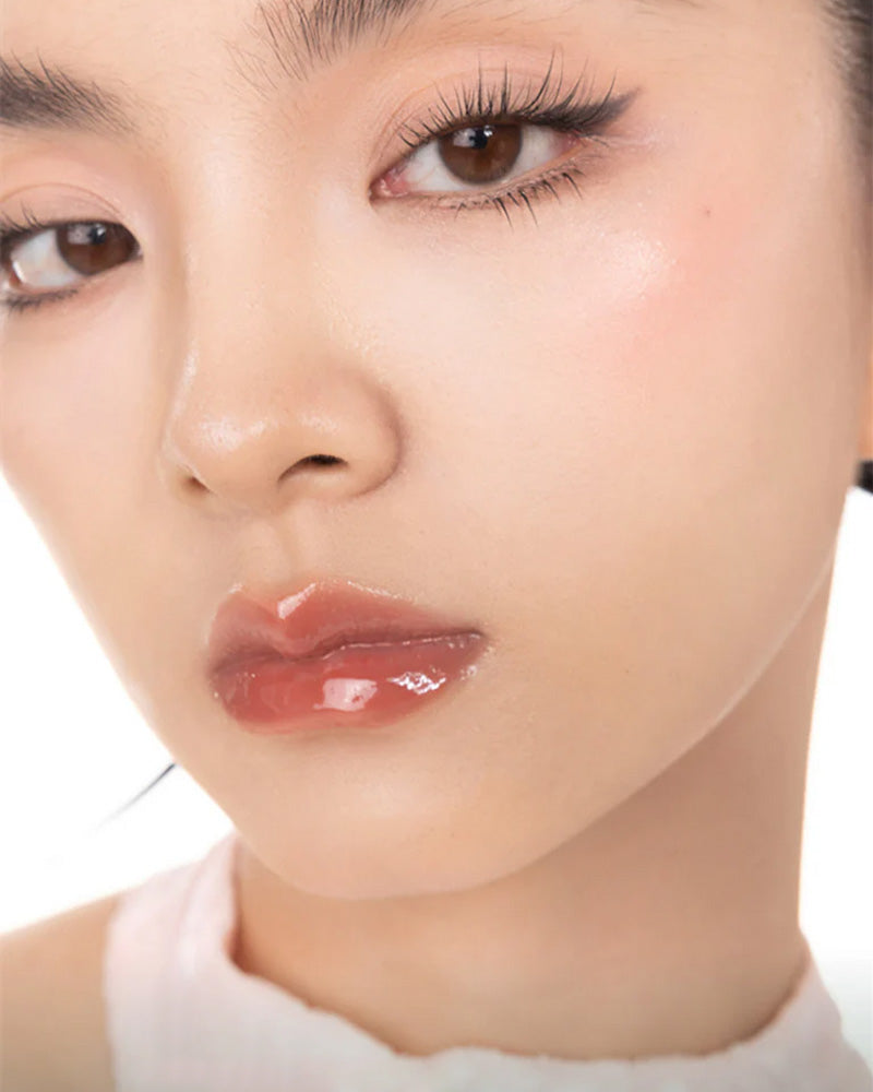 GIRLCULT Unreal Lip Gloss: Peach Festival